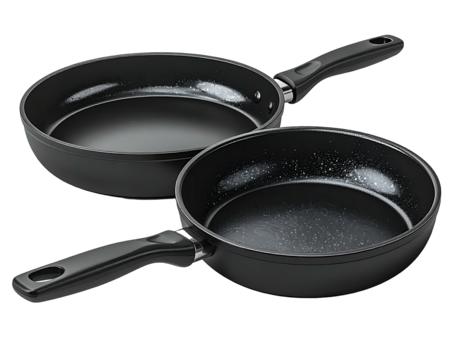 Two black frying pans, one atop the other