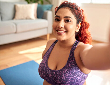 Happy woman exercising at home