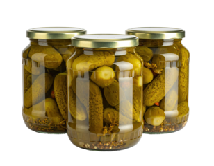 Three glass jars of pickled cucumbers