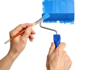 Hands painting with a roller and brush