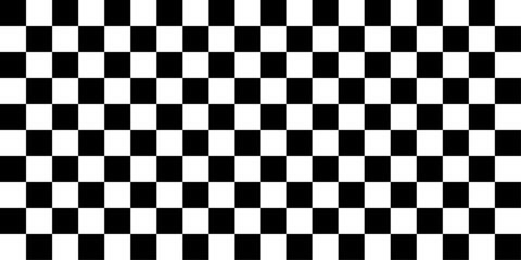 Fototapeta premium Classic high-resolution black and white checkered flag vector background. Seamless racing grid pattern, perfect geometric checkerboard wallpaper, and graphic element for speed and competition