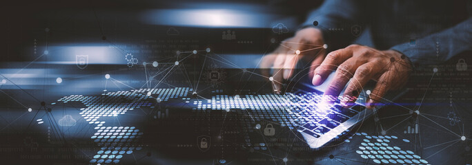 Global Digital Network Connection – Future of Cyber Technology and Data Innovation, a futuristic digital technology scene with hands typing on a laptop and abstract data network overlays.