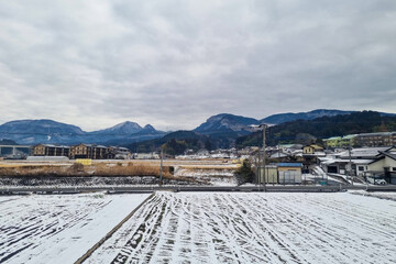 View of landscape Yufuin village in the winter after snow fall