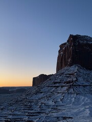 Snow-covered Monument valley at sunrise.