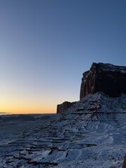 Snow-covered Monument valley at sunrise.