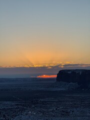 Snow-covered Monument valley at sunrise.