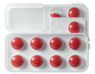 White pill organizer with red pills