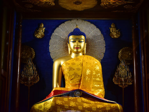 Statue of Lod Buddha at Mahabodhi Temple. where the Buddha attained enlightenment in 500 BCE and this destination is one of the most important places for Buddhist people.