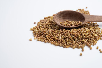 Buckwheat tea, herbs on a wooden board with a spoon. Tea ceremony. Herbal treatment.