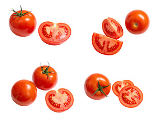 Fototapeta premium Fresh tomatoes, whole and sliced, isolated on black