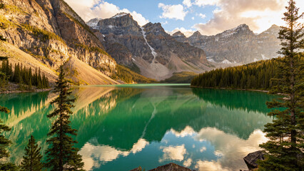 Mountain lake with green water and forest