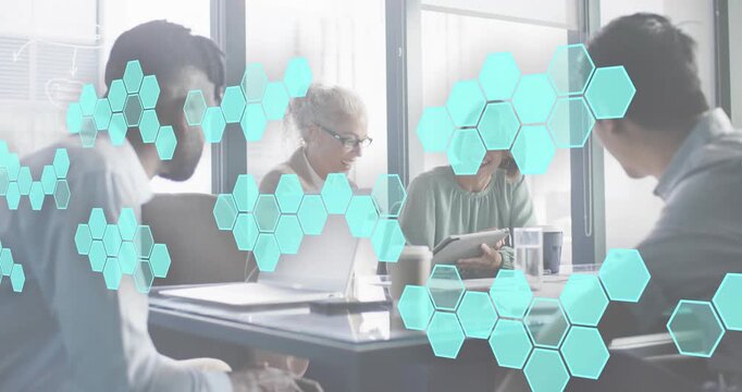 Colleagues initiating business insight as hex overlay fading in animating charts on devices
