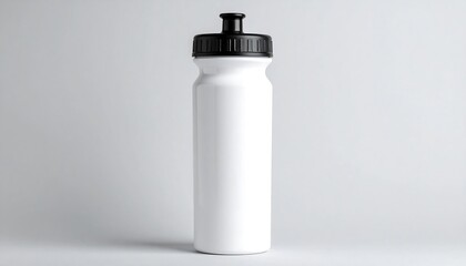 White plastic water bottle against a plain background