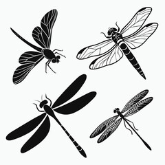 Four black silhouette vector designs of dragonflies