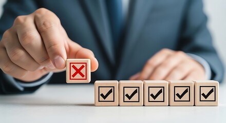 Businessman holding a wooden block with a red cross symbol, rejecting the last option in a row of checkmarks