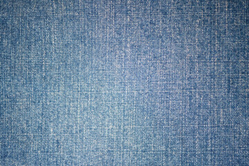 Denim fabric texture as a background macro photo.