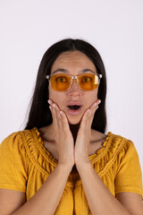 Woman in sunglasses with a surprised expression