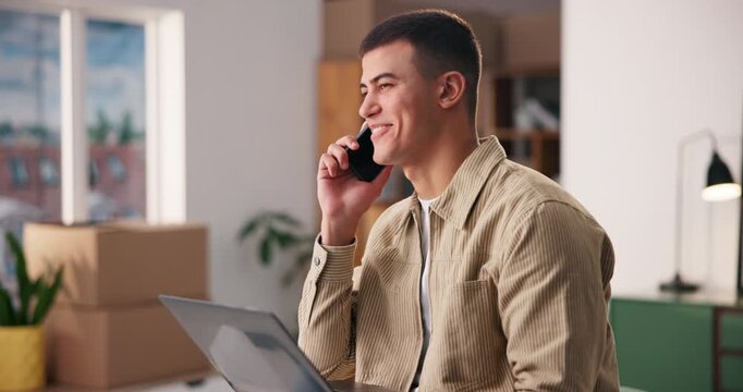 Laptop, phone call and man with smile for logistics, supply chain and small business office. Ecommerce, boxes and male person with tech, retail and shipping orders for invoice or online delivery