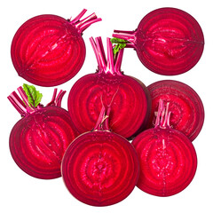 Sliced beets arranged on a black background, showing the vibrant red flesh and textured rings