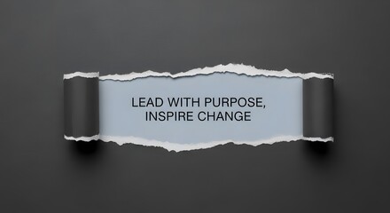 Inspire change and lead with purpose, a powerful business message revealed from behind torn paper, perfect for motivational campaigns and corporate leadership strategy
