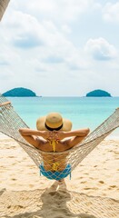 Obraz premium Relaxed female in hammock enjoying tropical beach view on sunny day