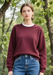 Fototapeta premium Woman in burgundy sweatshirt on the nature background