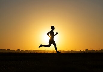 A runner's silhouette against a radiant sunset, capturing the essence of dedication and perseverance