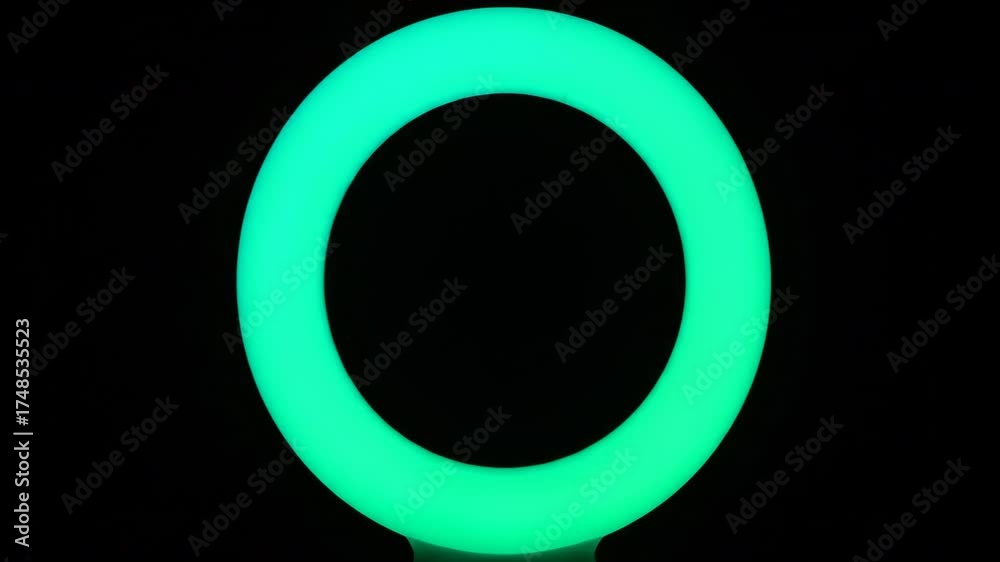 Sticker a luminous energy ring cycles through a spectrum of colors, displaying a mesmerizing light transitio