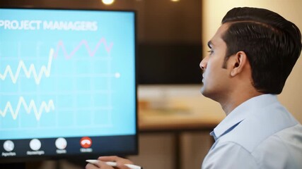 Young adult man in online video call presenting project managers data chart.