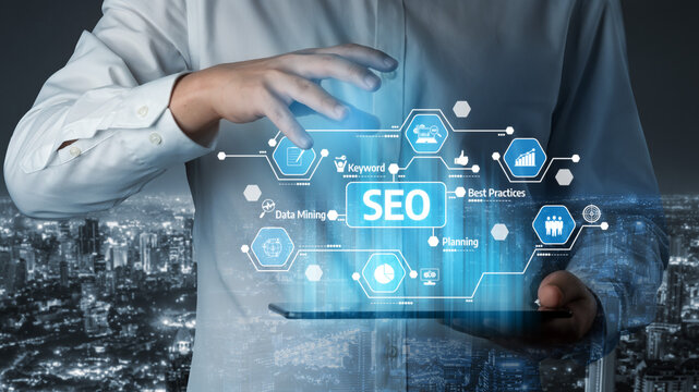 A professional hand interacts with a 3D SEO interface, showcasing digital marketing concepts against a stunning urban night cityscape, symbolizing innovation and strategy. Tessel