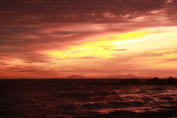 black orange sunset over the sea