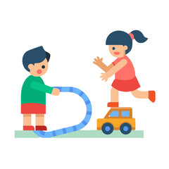 Children playing with a toy car and blue track