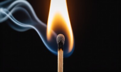 Close-up of a burning match against a black background, smoke curling around the flame