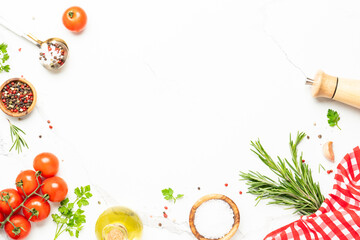 Spices, herbs, olive oil and fresh tomatoes.