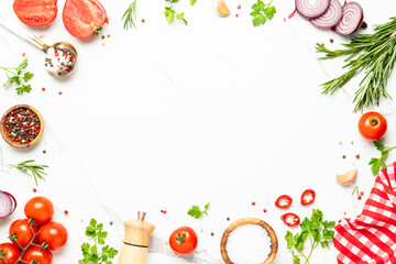 Spices, herbs, olive oil and fresh tomatoes.