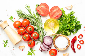 Food background, cooking ingredients on white marble table.