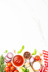 Food background, cooking ingredients on white marble table.