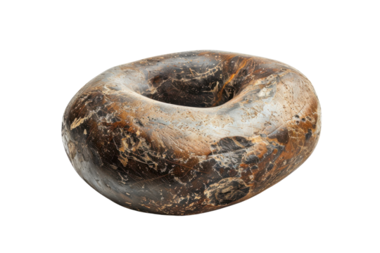 Unique volcanic stone crafted in a timeless, organic shape resting on a neutral backdrop