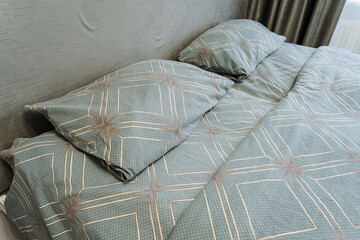 Experience the ultimate comfort with a cozy bed that features stylish and soft bedding alongside...