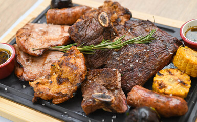 Grilled meats of different cuts of beef served in a restaurant