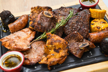 Grilled meats of different cuts of beef served in a restaurant