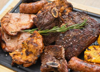 Grilled meats of different cuts of beef served in a restaurant