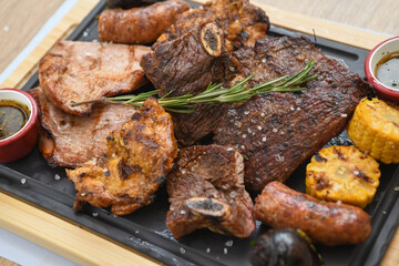 Grilled meats of different cuts of beef served in a restaurant