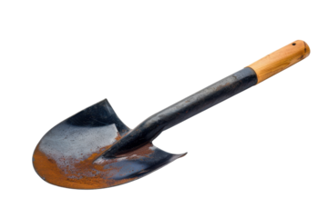A well-used shovel rests on a clean surface, showcasing its worn handle and polished blade isolated on transparent background