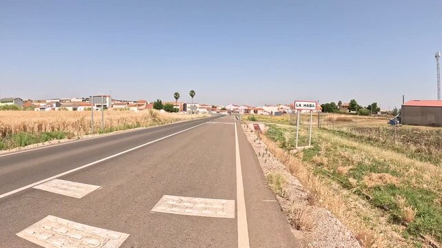 BA-084 paved road entering La Haba, province of Badajoz, Extremadura, Spain
