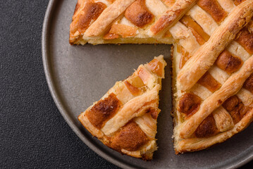 Sweet American pie with apples, pears, and cinnamon, a homemade dessert. Apple American pie
