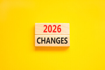 2026 Changes symbol. Concept words 2026 Changes on beautiful wooden blocks. Beautiful yellow paper background. Business and 2026 changes concept. Copy space.