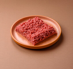 Raw ground beef for a burger or as an ingredient in a meat dish. Raw ground beef