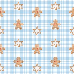 Seamless watercolor pattern with gingerbread cookies in the shape of stars and men on blue plaid background. Perfect for Christmas wrapping paper, textile, fabric print, wallpaper, and holiday design