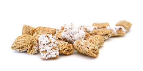 Breakfast setting with frosted wheat cereal on white background 